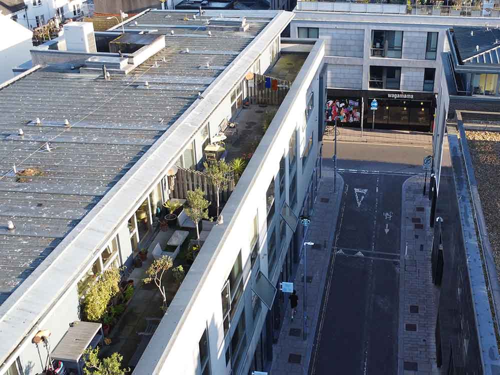 Commercial property as seen from above with third storey apartments