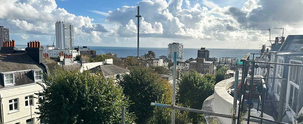 Property valuations scenery over the rooftops of Brighton to the see and the i360.